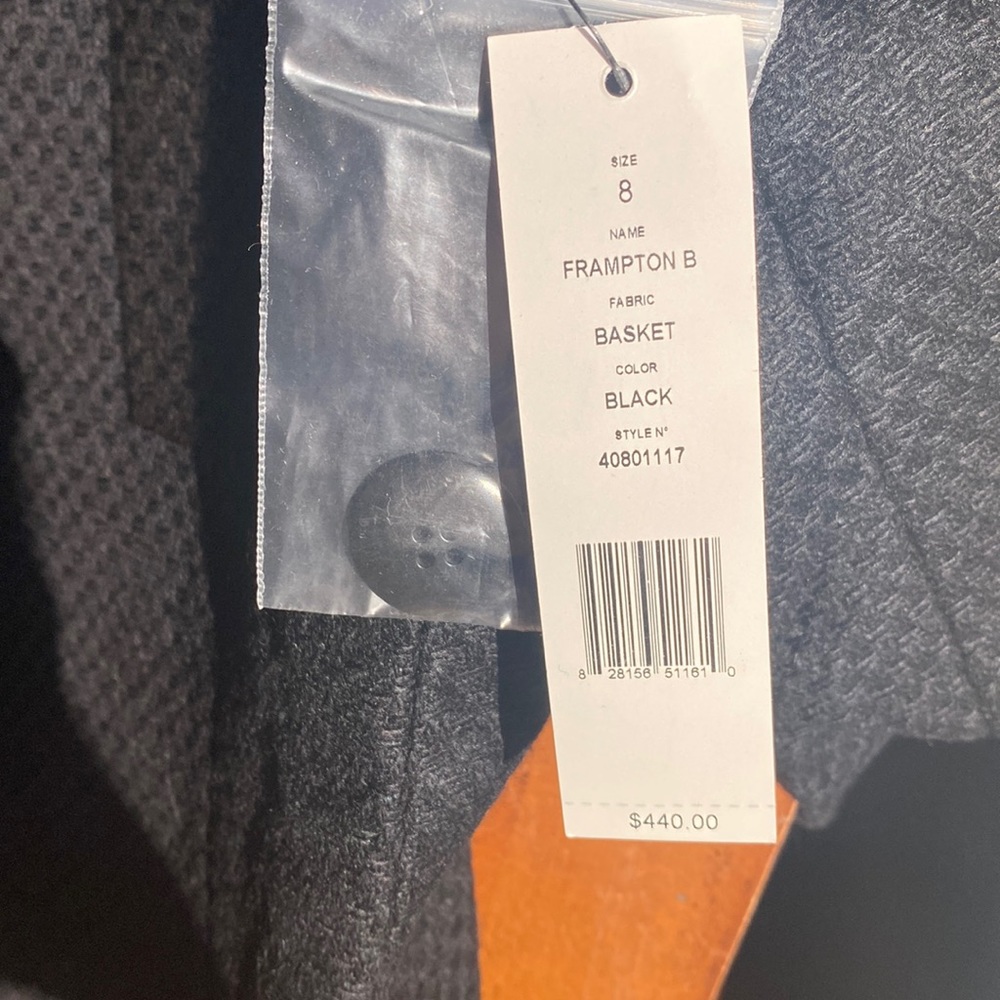 98 % Wool made in USA. New with tags. Beautiful black Theory blazer. Size 8.